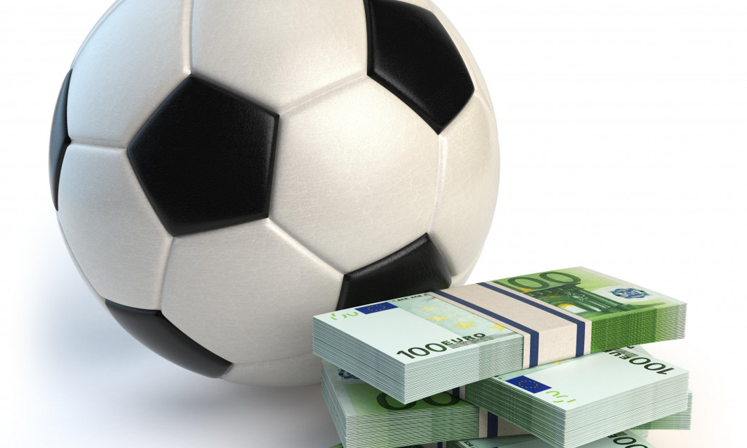Soccer or football ball and packs of euro isolated on white. Sport bets concept. 3d illustration