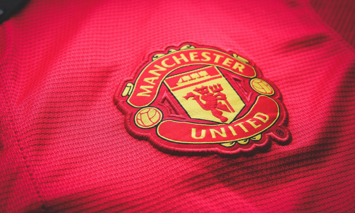 Manchester United. Logo embroidered on the T-shirt. Red Devil Football Club of England. Royal Football Club.