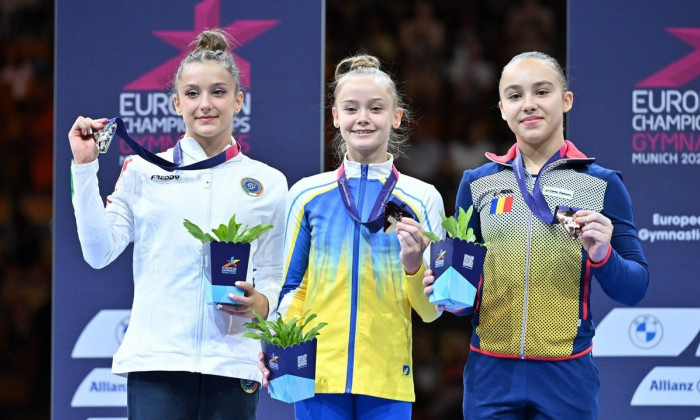 Munich, Germany. 14th Aug, 2022. Medal Ceremony BEAM Gold: Anna Lashchevska (UKR) Silver: Arianna Grillo (ITA) Bronze: Amalia Puflea (ROU) during European Women's Artistic Gymnastics Championships - Junior and Senior Women&#x80;&#x99;s Individual Apparatu