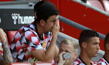 Southampton, England, 27th August 2022. Harry Maguire of Manchester United holds his head in hands as he sits on the subs bench during the Premier League match at St Mary's Stadium, Southampton. Picture credit should read: Paul Terry / Sportimage