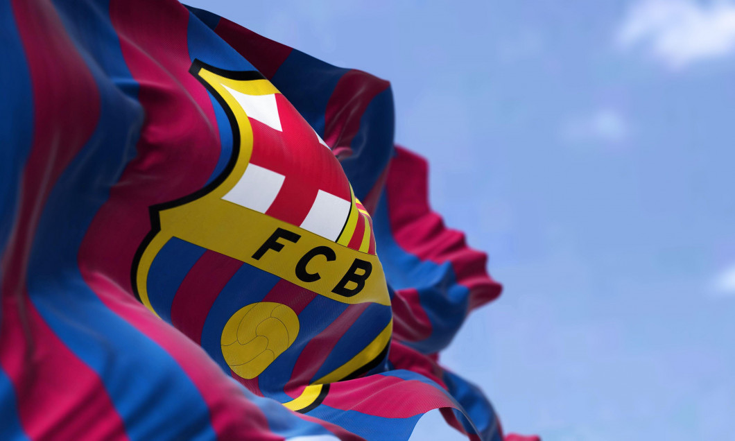 Madrid, Spain, May 2022: The flag FC Barcelona waving in the wind on a clear day. FC Barcelona is a Spanish professional football club based in Barcel