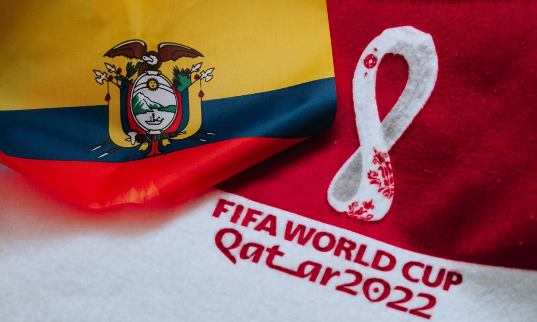 QATAR, DOHA, 18 JULY, 2022: Ecuador National flag and logo of FIFA World Cup in Qatar 2022 on red carpet. Soccer sport background, edit space. Qatar 2