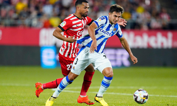 Yangel Herrera of Girona FC and Martin Zubimendi of Real Sociedad during the La Liga match between Girona FC and Real Sociedad played at Montilivi Stadium on October 02, 2022 in Girona, Spain. (Photo by Sergio Ruiz / PRESSIN)