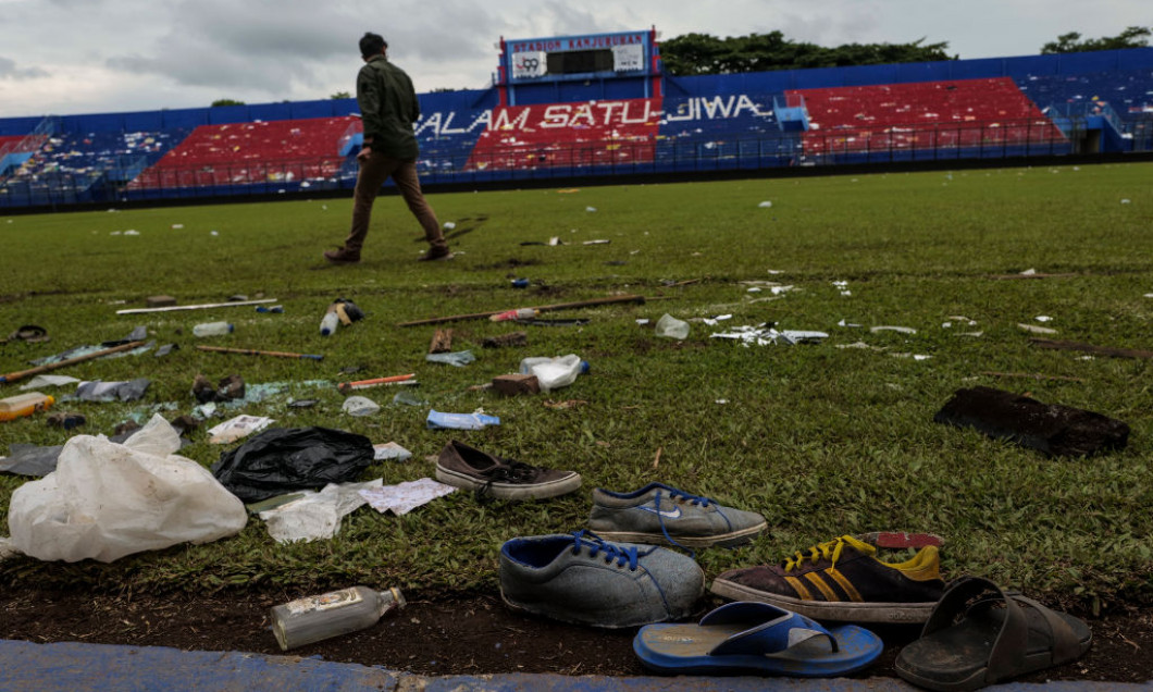 Relatives Grieve After Riot And Stampede At Football Match