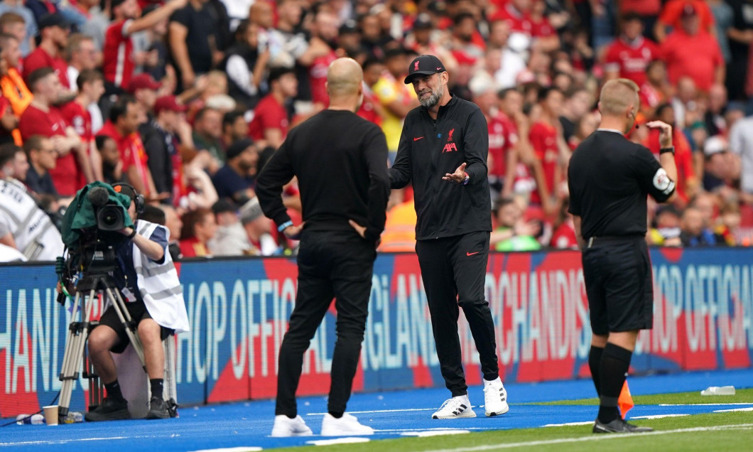 Manchester City manager Pep Guardiola (left) and Liverpool manager Jurgen Klopp on the touchline during the FA Community Shield match at the King Power Stadium, Leicester. Picture date: Saturday July 30, 2022.