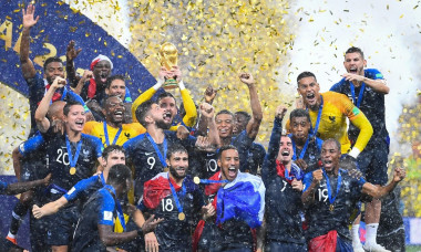 Moscow, Russland. 15th July, 2018. Winning ceremony: Goalkeeper Hugo Lloris (France, h.) Blows up the World Cup trophy in the pouring rain. GES/Football/World Championship 2018 Russia, Final: France- Croatia, 15.07.2018 GES/Soccer/Football, World Cup 2018
