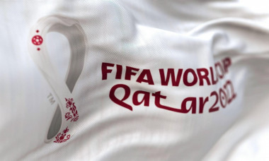 Doha, QA, October 2022: Detail of the FIFA Qatar 2022 World Cup white flag waving in the wind. The World Cup will take place in Qatar from 20 November
