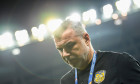 The head coach of Chinese Super League side Jiangsu Suning Cosmin Olaroiu reacts during the second round of the final of