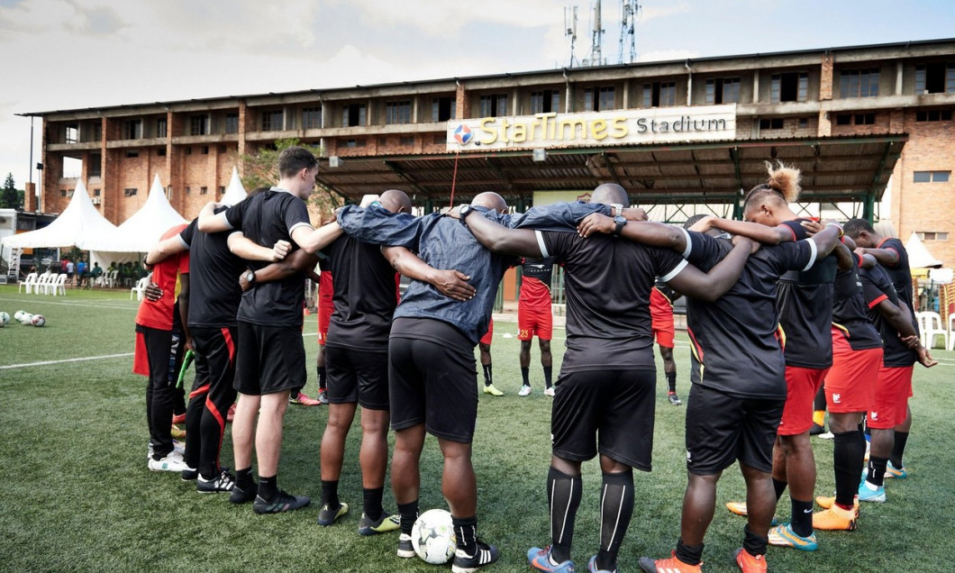 Kampala, Uganda. 13 Dec 2019. Uganda squad players and technical staff pray at the begging of training. Uganda National Team in Training for the CECAFA Senior Challenge Cup 2019. Star Times Stadium at Lugogo. Credit: XtraTimeSports (Darren McKinstry)