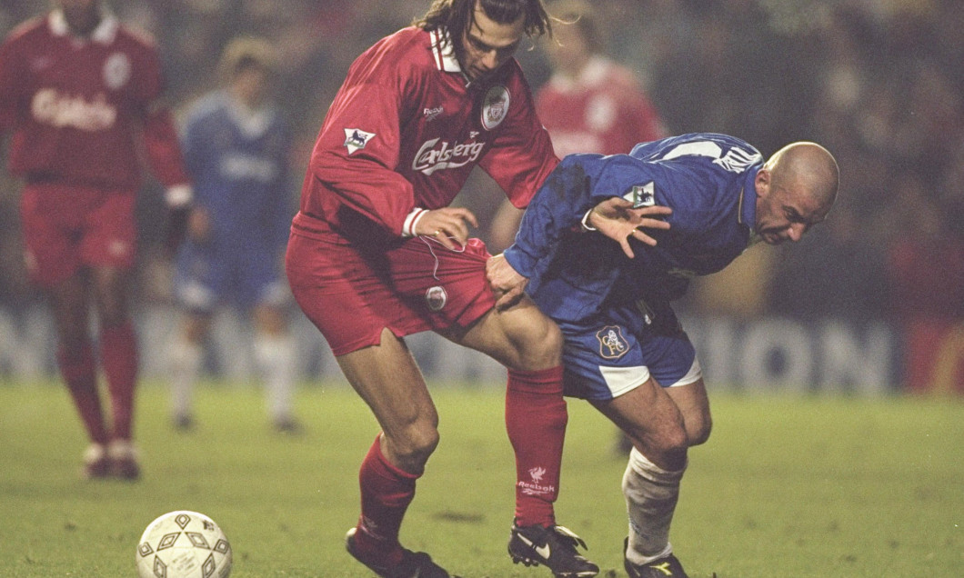 Patrick Berger of Liverpool tangles with Gianluca Vialli of Chelsea