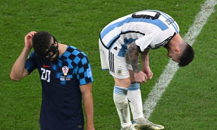 Lusail, Qatar. 13th Dec, 2022. Soccer, World Cup, Argentina - Croatia, final round, semifinal, Lusail Stadium, Argentina's Lionel Messi cheers next to Croatia's Josko Gvardiol at the final whistle. Credit: Robert Michael/dpa/Alamy Live News