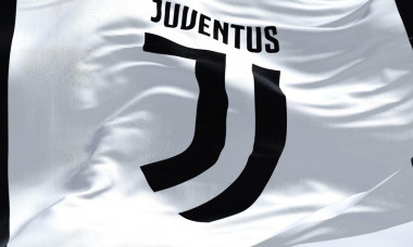 Turin, Italy, July 2022: The flag of Juventus Football Club waving. Juventus is a professional football club based in Turin. Italy