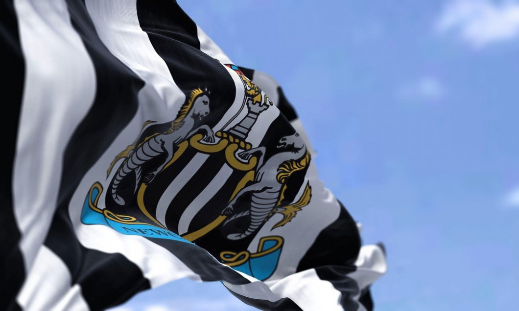 Newcastle, UK, May 2022: The flag of Newcastle United waving in the wind on a clear day. Newcastle United is an English professional football club bas