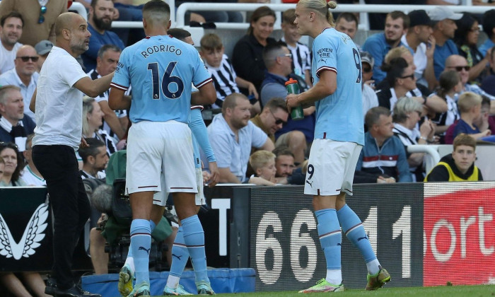 Manchester City Manager Pep Guardiola gives instructions to Erling Haaland of Manchester City during the Premier League match between Newcastle United and Manchester City at St. James's Park, Newcastle on Sunday 21st August 2022. (Credit: Robert Smith | M