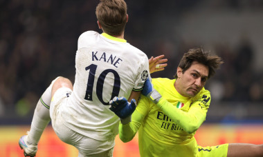 Milan, Italy, 14th February 2023. Harry Kane of Tottenham clashes with Ciprian Tatarusanu of AC Milan during the UEFA Ch