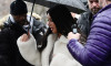 American reality TV Megastar Kim Kardashian pictured bearing the rainy London weather as she treats her seven-year-old son Saint to visit The London Eye.