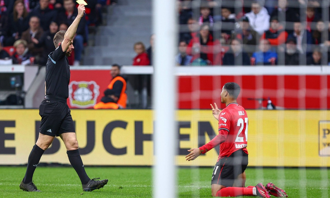 Schiedsrichter Tobias Stieler gibt Gelb an Amine Adli (Bayer 04 Leverkusen) Bayer 04 Leverkusen vs. FC Bayern Muenchen,