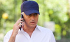 *EXCLUSIVE* Former Manchester United manager Jose Mourinho is pictured with personalized white shirt while out on his phone on the Kings Road in Chelsea.