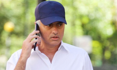 *EXCLUSIVE* Former Manchester United manager Jose Mourinho is pictured with personalized white shirt while out on his phone on the Kings Road in Chelsea.