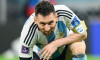 Al Rajjan, Qatar. 03rd Dec, 2022. Soccer: World Cup, Argentina - Australia, Final round, Round of 16, Ahmad bin Ali Stadium. Argentina's Lionel Messi squats on the ground. Credit: Robert Michael/dpa - IMPORTANT NOTE: In accordance with the requirements of
