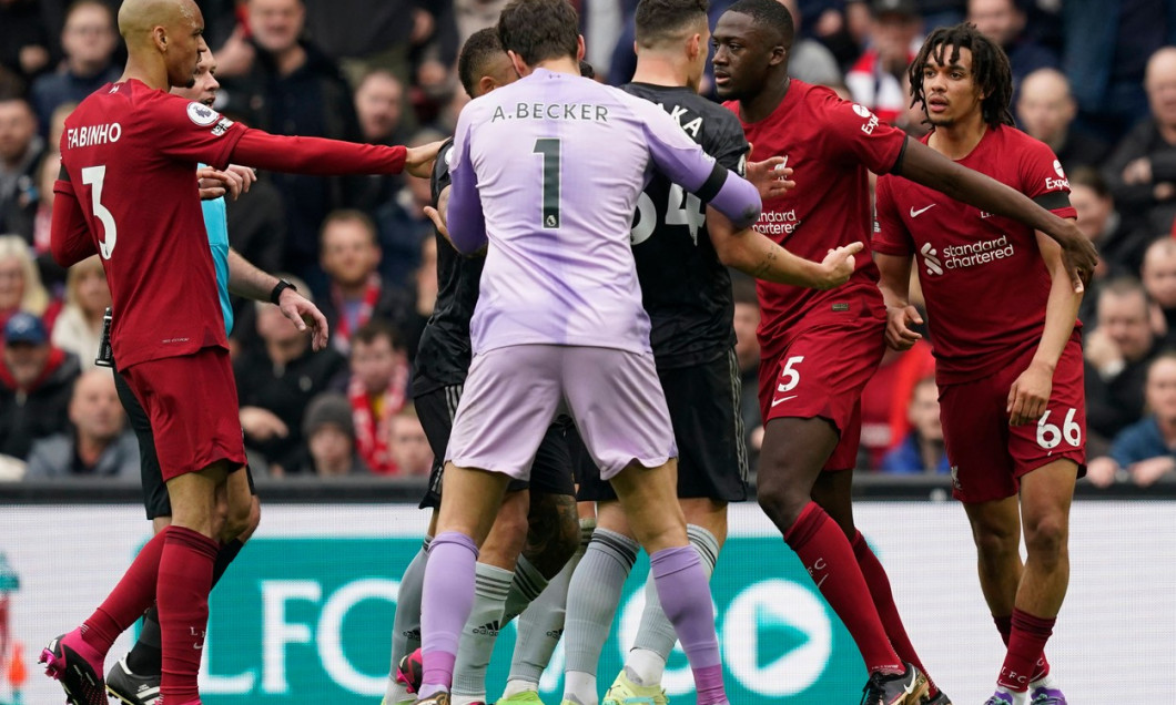 Liverpool, England, 9th April 2023. Trent Alexander-Arnold of Liverpool clashes with Granit Xhaka of Arsenal during the