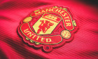 Manchester United. Logo embroidered on the T-shirt. Red Devil Football Club of England. Royal Football Club.