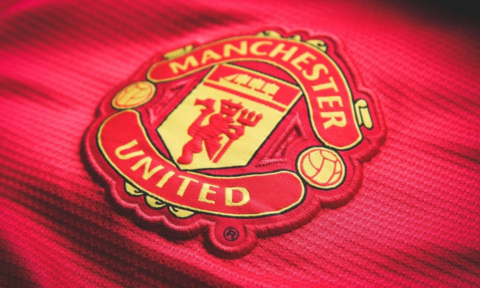 Manchester United. Logo embroidered on the T-shirt. Red Devil Football Club of England. Royal Football Club.