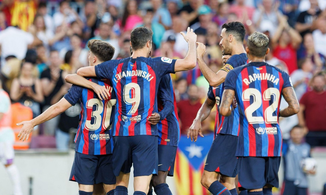 BARCELONA - AUG 28: Barcelona players celebrate after scoring a goal during the LaLiga match between FC Barcelona and Real Valladolid at the Spotify C