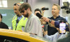 *EXCLUSIVE* Gerard Pique is ambushed by media as he arrives at Miami International Airport
