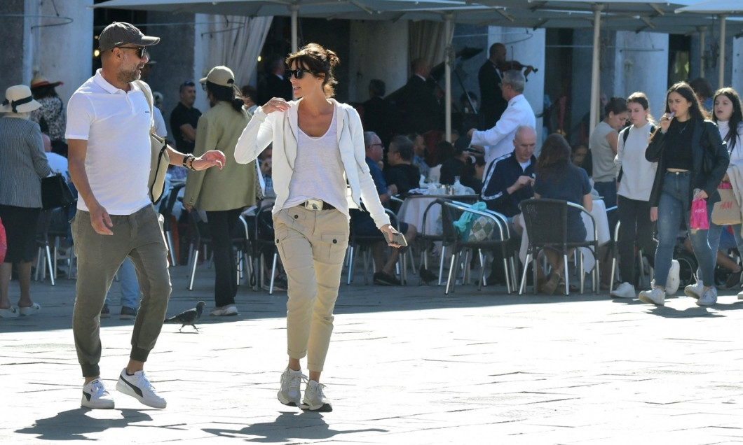 *EXCLUSIVE* WEB MUST CALL FOR PRICING - Manchester City coach Pep Guardiola takes some time out during the international break with his wife Cristina Serra as the pair take a sightseeing stroll through the romantic city of Venice.