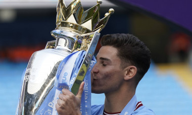 Manchester, England, 21st May 2023. Julian Alvarez of Manchester City with the Premier League Trophy during the Premier
