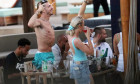 *PREMIUM-EXCLUSIVE* MUST CALL FOR PRICING BEFORE USAGE - STRICTLY NOT AVAILABLE FOR ONLINE USAGE 17:20 PM UK TIME ON 23/07/2021 - The party is in full swing for the England footballers Luke Shaw and Jack Grealish on their boozed-up pre-season holiday