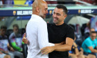 Barcelona, Spain. 24th Aug, 2022. Pep Guardiola of Manchester City with Xavi Hernandez of FC Barcelona during the benefic friendly match to raise funds for ELA between FC Barcelona and Manchester City at Spotify Camp Nou in Barcelona, Spain. Credit: DAX I