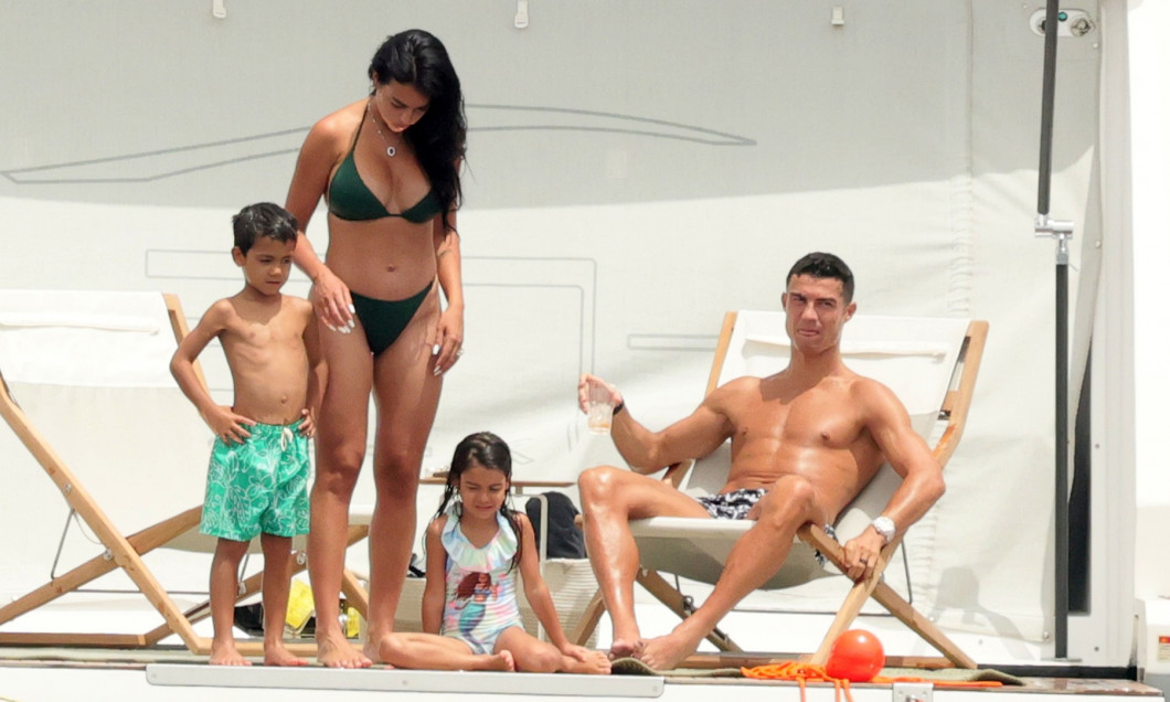 HOT BODS! Cristiano Ronaldo Shows Off His Ripped Physique With Bikini Clad Georgina Rodriguez On A Yacht In Sardinia, Italy