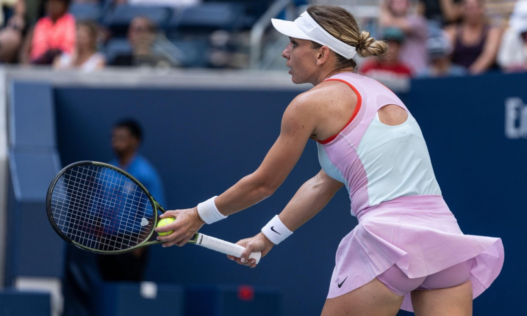 New York, NY - August 29, 2022: Simona Halep of Romania serves during 1st round of US Open Tennis Championship against Daria Snigur of Ukraine at Billie Jean King National Tennis Center