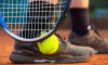 Symbol image Tennis: Close-up of a tennis player on a clay court