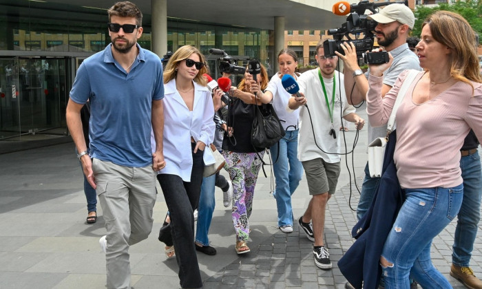 Gerard Pique and Clara Chia brave the media frenzy in Barcelona