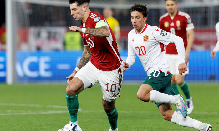 BUDAPEST, HUNGARY - MARCH 27: Dominik Szoboszlai of Hungary leaves Filip Krastev of Bulgaria behind during the UEFA EURO 2024 qualifying round group B match between Hungary and Bulgaria at Puskas Arena on March 27, 2023 in Budapest, Hungary.