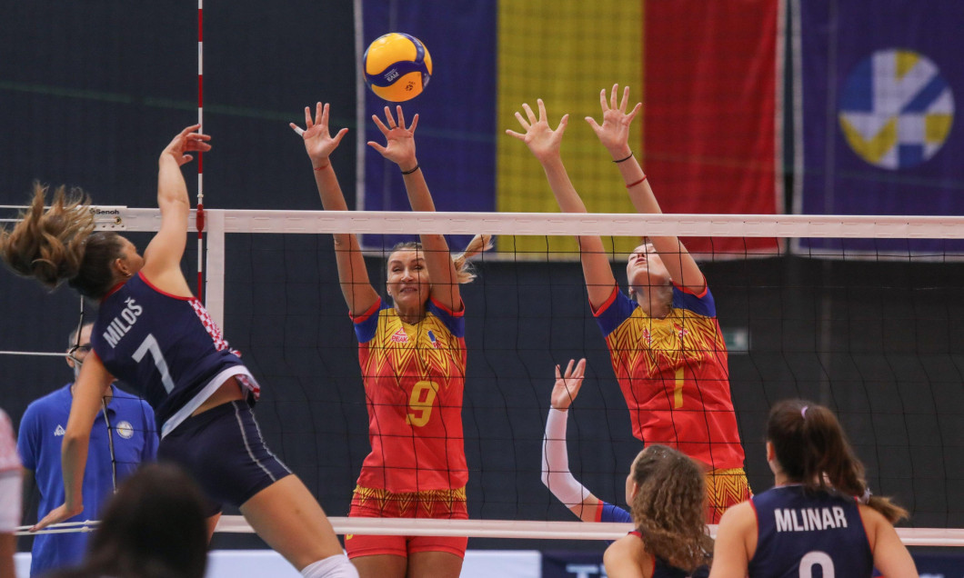 Ana-Marisa Radu and Diana-Andreea Ariton of Romania attempt to block a spike during European Volleyball Women's Championship Qualification Group A match between Croatia and Romania at Gradski Vrt indoor Arena on August 28, 2022 in Osijek, Croatia. Credit: