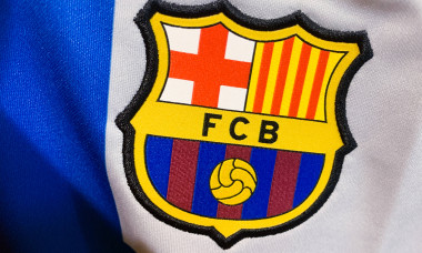 Football Emblems And Logos FC Barcelona logo is seen on a football jersey in this illustration photo taken in a store in