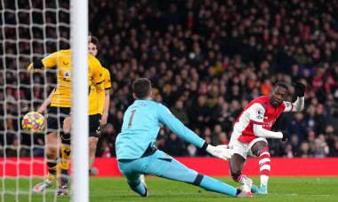 Arsenal's Nicolas Pepe (right) scores their side's first goal of the game during the Premier League match at Emirates Stadium, London. Picture date: Thursday February 24, 2022.