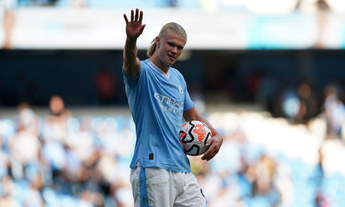 Manchester City's Erling Haaland celebrates with the match ball after scoring a hat-trick, following the Premier League match at the Etihad Stadium, Manchester. Picture date: Saturday September 2, 2023.