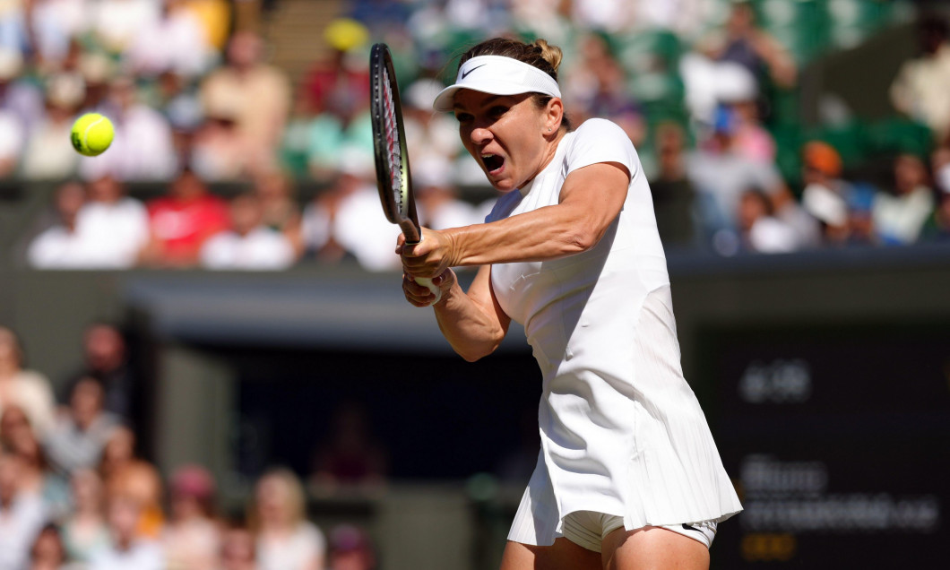 Simona Halep in action against Elena Rybakina during the Ladies Singles Semi Final on day eleven of the 2022 Wimbledon Championships at the All England Lawn Tennis and Croquet Club, Wimbledon. Picture date: Thursday July 7, 2022.