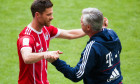 Munich's Xabi Alonso (L) and manager Carlo Ancelotti hug at the end of the German Bundesliga soccer match between Bayern Munich and SC Freiburg in the Allianz Arena in Munich, Germany, 20 May 2017. (EMBARGO CONDITIONS - ATTENTION: Due to the accreditat