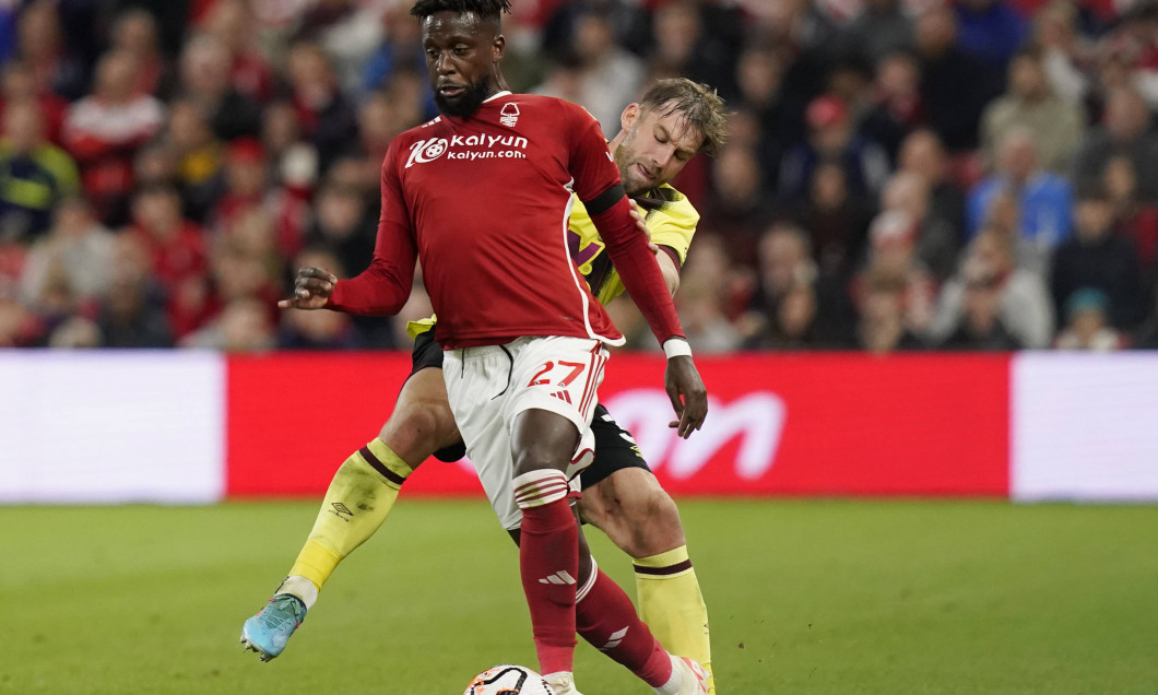 Nottingham, England, 18th September 2023. Divock Origi of Nottingham Forest tackled by Charlie Taylor of Burnley during