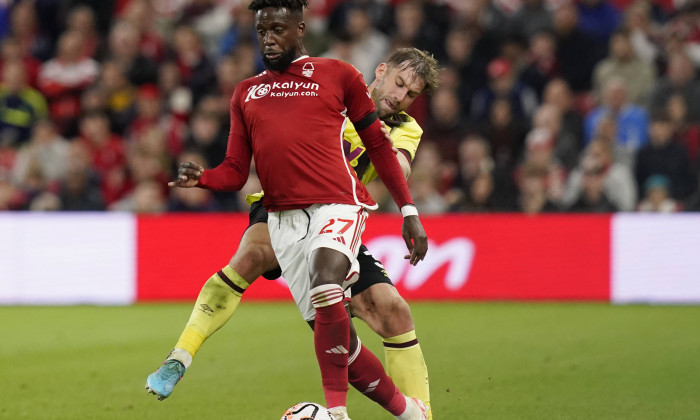 Nottingham, England, 18th September 2023. Divock Origi of Nottingham Forest tackled by Charlie Taylor of Burnley during