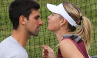 Maria Sharapova and Novak Djokovic during a practice session on day one of the Wimbledon Lawn Tennis Championships at the All England Lawn Tennis and Croquet Club in London