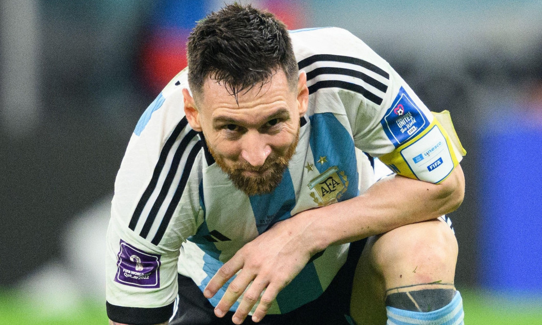 Al Rajjan, Qatar. 03rd Dec, 2022. Soccer: World Cup, Argentina - Australia, Final round, Round of 16, Ahmad bin Ali Stadium. Argentina's Lionel Messi squats on the ground. Credit: Robert Michael/dpa - IMPORTANT NOTE: In accordance with the requirements of