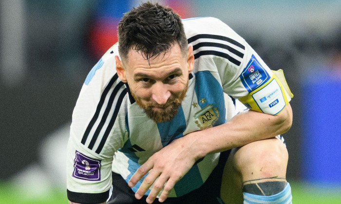 Al Rajjan, Qatar. 03rd Dec, 2022. Soccer: World Cup, Argentina - Australia, Final round, Round of 16, Ahmad bin Ali Stadium. Argentina's Lionel Messi squats on the ground. Credit: Robert Michael/dpa - IMPORTANT NOTE: In accordance with the requirements of