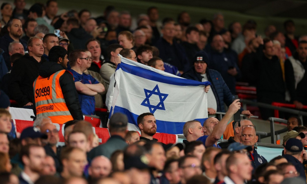 Wembley Stadium, London, UK. 13th Oct, 2023. International Football Friendly, England versus Australia; A Israel flag is held up by a fan Credit: Action Plus Sports/Alamy Live News